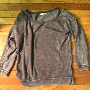 Fashionably worn sweatshirt